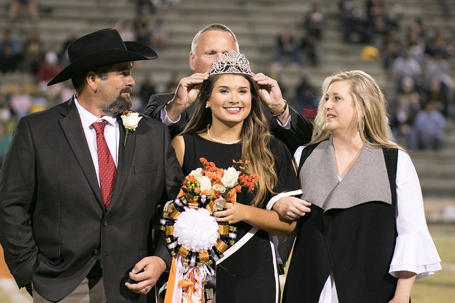 Senior Morgan Cook receives her crown as the 2017 homecoming queen. Texas High played Mt. Pleasant at Tiger Stadium on Friday, Oct. 20.