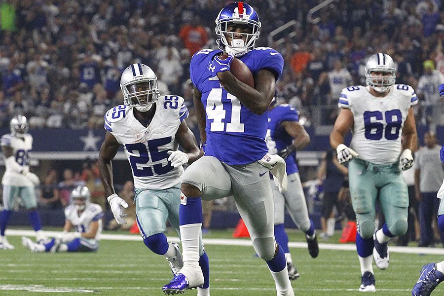 New York Giants cornerback Dominique Rodgers-Cromartie (41) runs for touchdown in the second quarter after a fumble by the Dallas Cowboys' Cole Beasley on Sunday, Sept. 13, 2015, at AT&T Stadium in Dallas. (Richard W. Rodriguez/Fort Worth Star-Telegram/TNS)