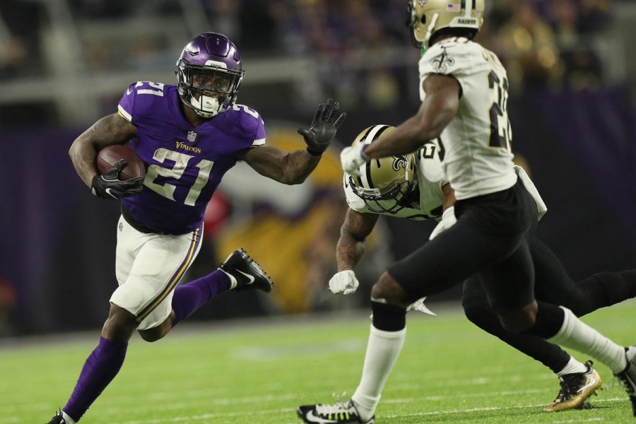 Minnesota Vikings running back Jerick McKinnon tries to avoid New Orleans Saints cornerback Ken Crawley (20) during the NFC divisional playoff game on Sunday, January 14, 2018 at U.S. Bank Stadium in Minneapolis, Minn. (Brian Peterson/Minneapolis Star Tribune/TNS)

