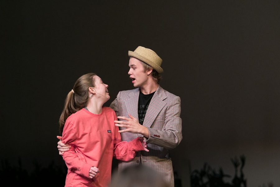 Senior Colton Johnson and freshman Cate Rounds sing together during Oklahoma practice. The show will open tomorrow, and stay open through the weekend.