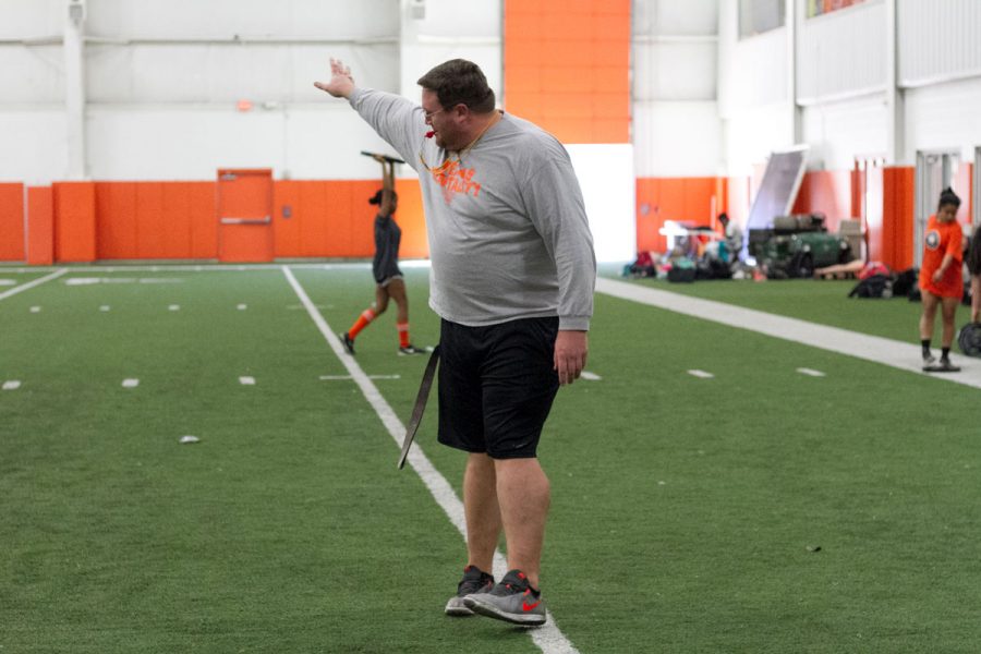 Coach Pond organizes his training regiment at a girls soccer practice. Pond uses different conditioning techniques to meet the needs of each sport due to the variety of traits and schedules that each team must work around.