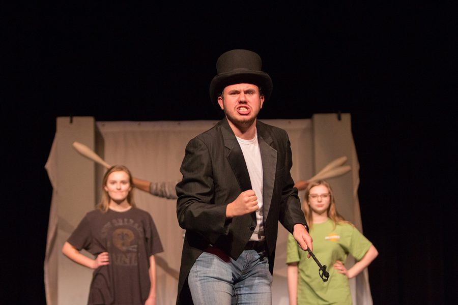 Senior Brennon Cope practices a scene from the UIL One Act Play Silenced on Barbour Street. The Tiger Theatre Company will perform the show on March 5, free of charge.