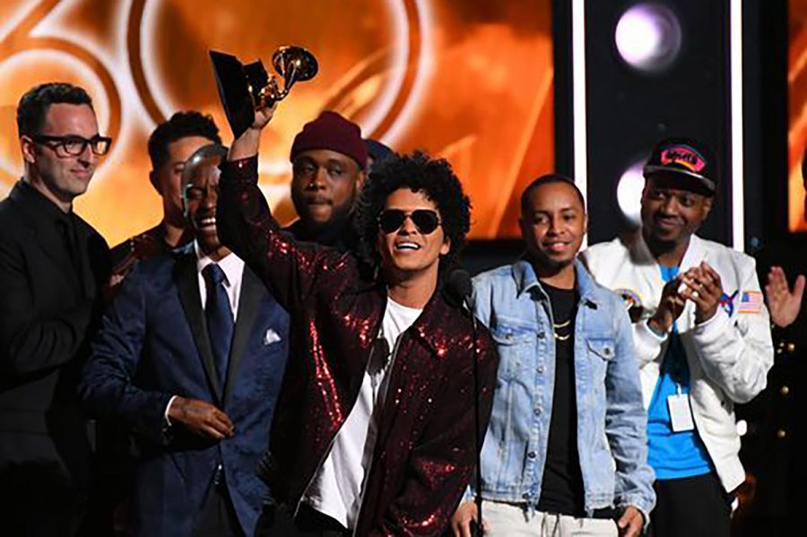 Bruno+Mars+holds+his+award+he+won+at+the+annual+Grammys.+Photo+from+Grammy.com