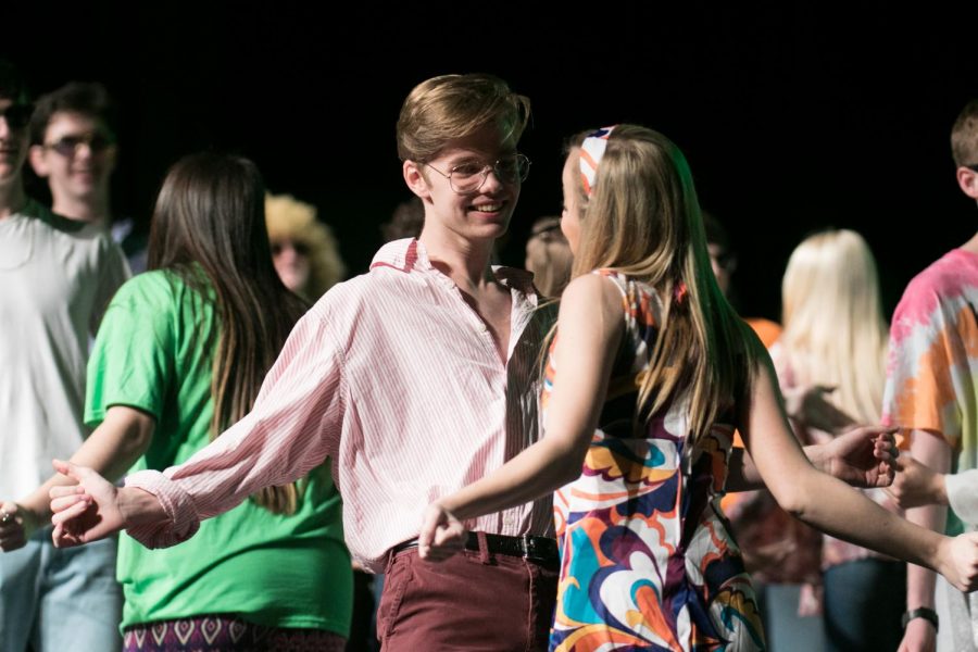 Seniors Colton Johnson and Laiken McKay dance together in the senior dance, Shake Your Groove Thing.