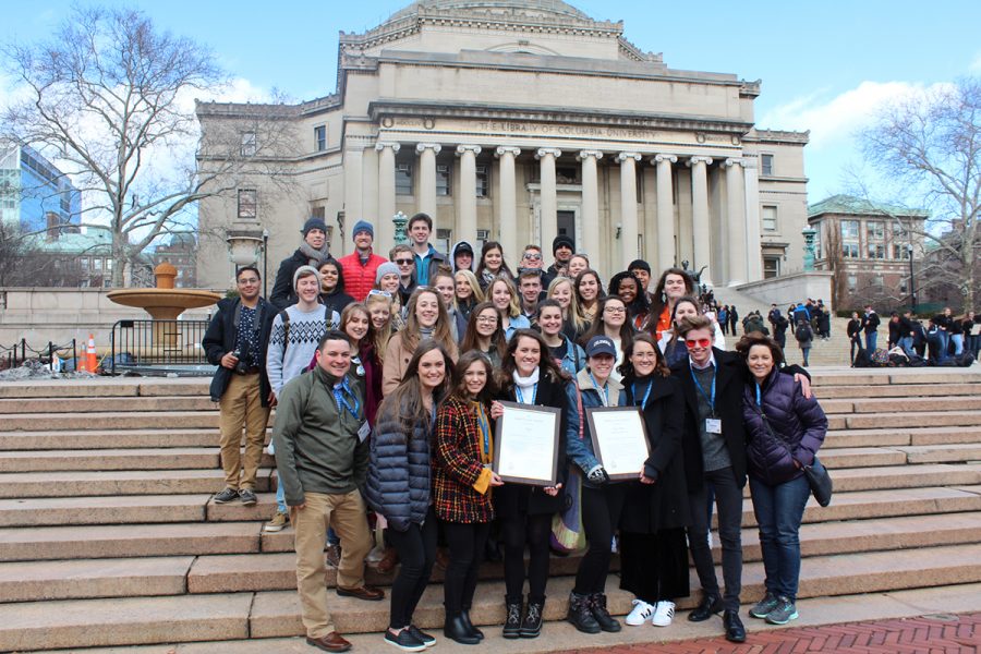 Editors, staff and advisors of yearbook and newspaper gather for a picture at the steps of Columbia University after winning gold across the board. Submitted photo