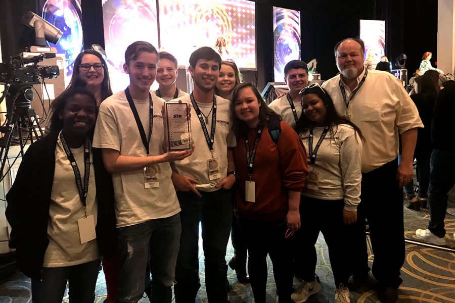 TigerVision students celebrate with juniors Kaden Lloyd and Colton Capps after they won the Best Director award at the Student Television Network Competition in Nashville, TN, and select TigerVision students won a trip to travel to Moscow, Russia, in an exchange program to make videos. Submitted Photo