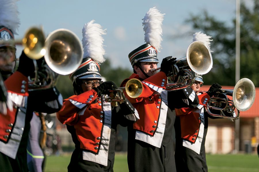 Sophomore Grey Johnson performs at the Four States Marching Contest in the Tiger Marching Band. The Tri-M Music Honor Society will begin at Texas High in August 2018. The honor society will include the three musical organizations on campus which consist of band, choir and orchestra.