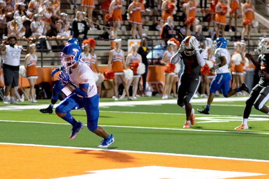 K’Lon Warren scores a touchdown for John Tyler in the second quarter of the first district game of the 2018 football season. The Lions beat the Tigers 51-13 on September 28, 2018 at Tiger Stadium. 
