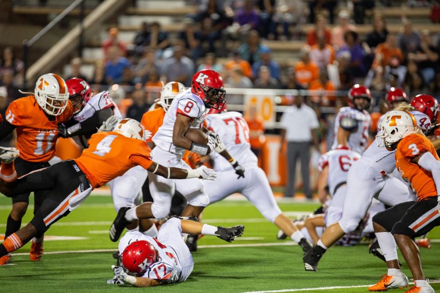 Kilgores Kennieth Lacy carries the ball through the Tigers defense September 21, 2018 at Tiger Stadium. The Bulldogs defeated Texas High 42-14.