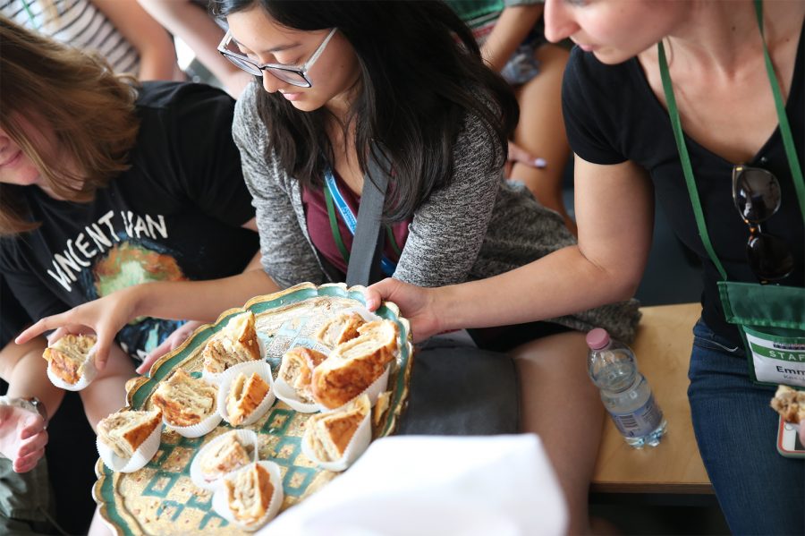FutureDocs students enjoy hand crafted Saint Martin croissants in the market square of Poznan, Poland.