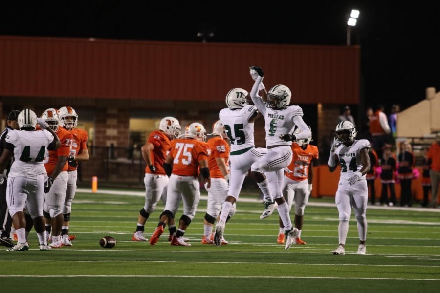 Mesquite Poteet Pirates celebrate after taking down a Texas High Tiger. Poteet beat Texas High with a score of 46 to 28.