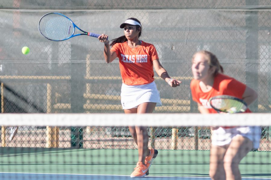 Shreya+Kurichety+returns+a+volley+durring+a+doubles+match+against+Lyndale+on+Thursday+October+11th+2018+District+Championship+game.+The+Tiger+tennis+team+took+the+victory+at+the+tournament.