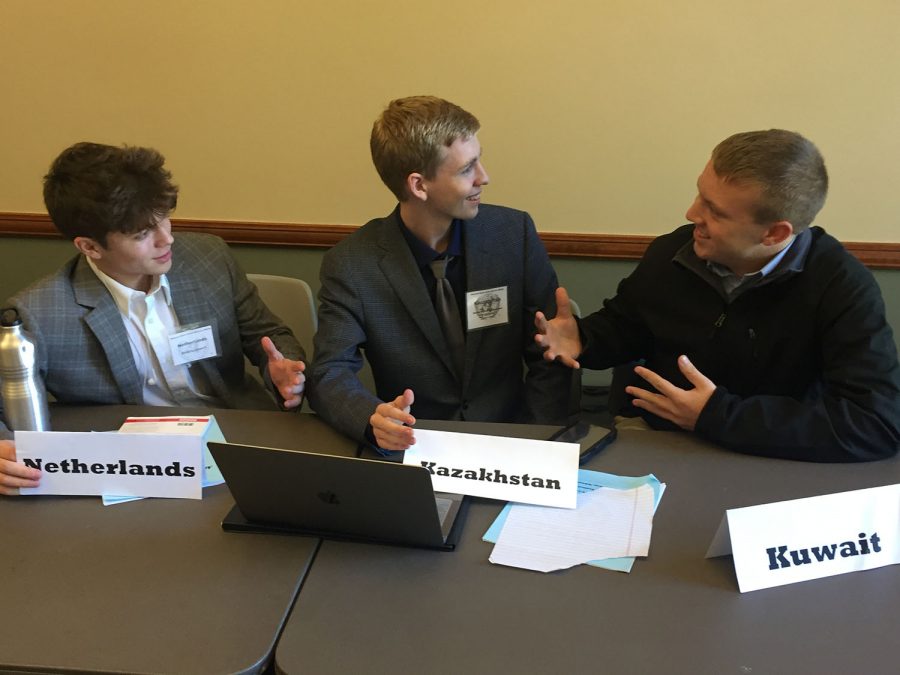 Senior Thomas Strutton debates other delegates in the United Nations Environmental Programme. The Texas High Model UN Delegation competed at the Arkansas Model United Nations on Nov. 16 and 17. 