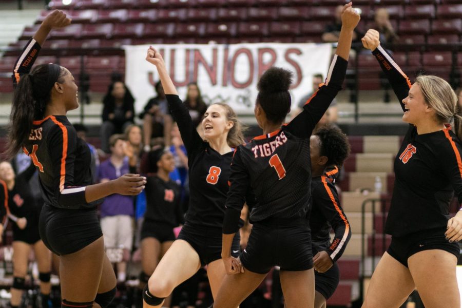 The Lady Tigers celebrate after scoring a point against the Joshua Lady Owls in the regional quarterfinal. They play the Wakeland Wolverines on Friday at Richardson Berkner High School at 5 p.m. 