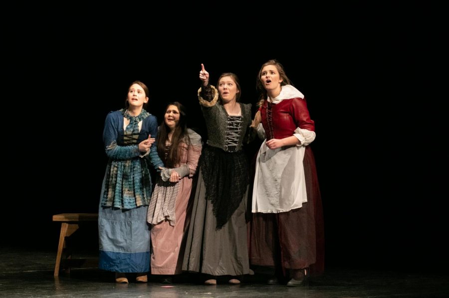 Sophomore Cate Rounds, junior Addison Cross, and seniors Rachel Johnson and Abby Cannon point and gaze offstage in horror. The Tiger Theatre Companys UIL One Act Play troupe placed second at the district meet on Tuesday. 