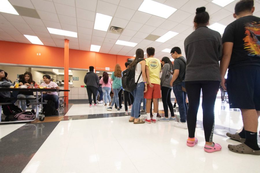 The lines continue to grow as students wait to pick their lunch. The students rushed to the lunch line to get first pick of their food.