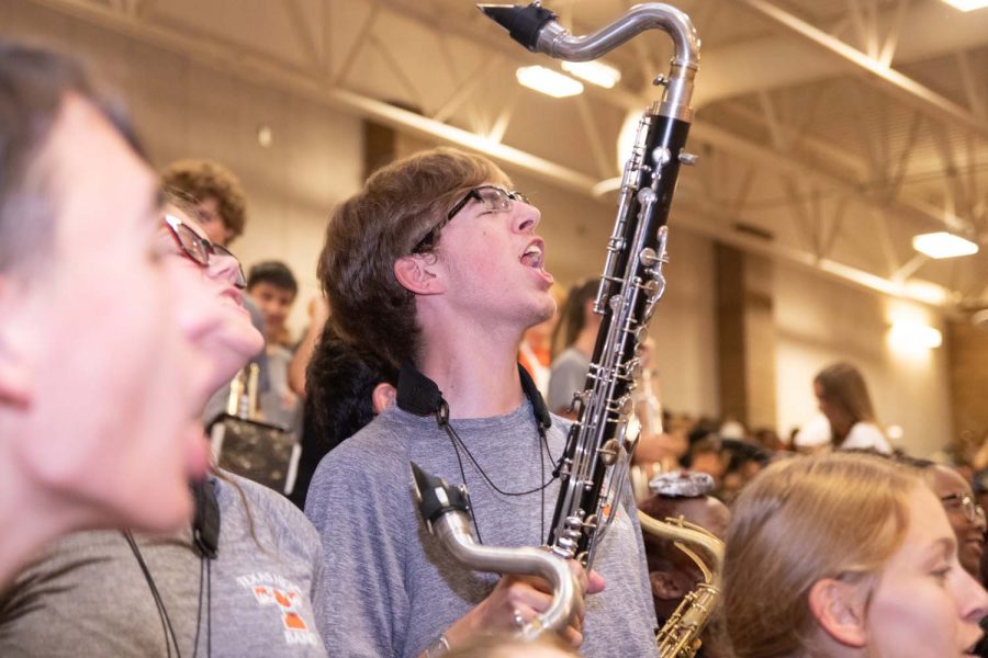 Senior Noah Addie cheers along to the tuba song at the pep rally. The tuba song was played for the first time in 2 years.