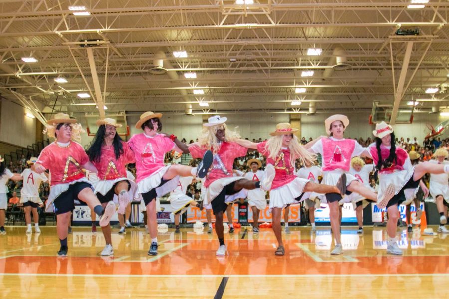 Texas High mocks Arkansas High in the annual tradition of the A-line dance as they prepare for the big game tonight. The students cheer and rally to show their support for the Texas vs. Arkansas game.