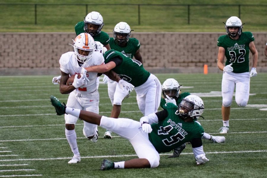 Tracy Cooper rushes against Mesquite Poteet defense on Oct. 11, 2019. The Tigers lost to the Pirates with a score of 10-55 to remain winless in district play.