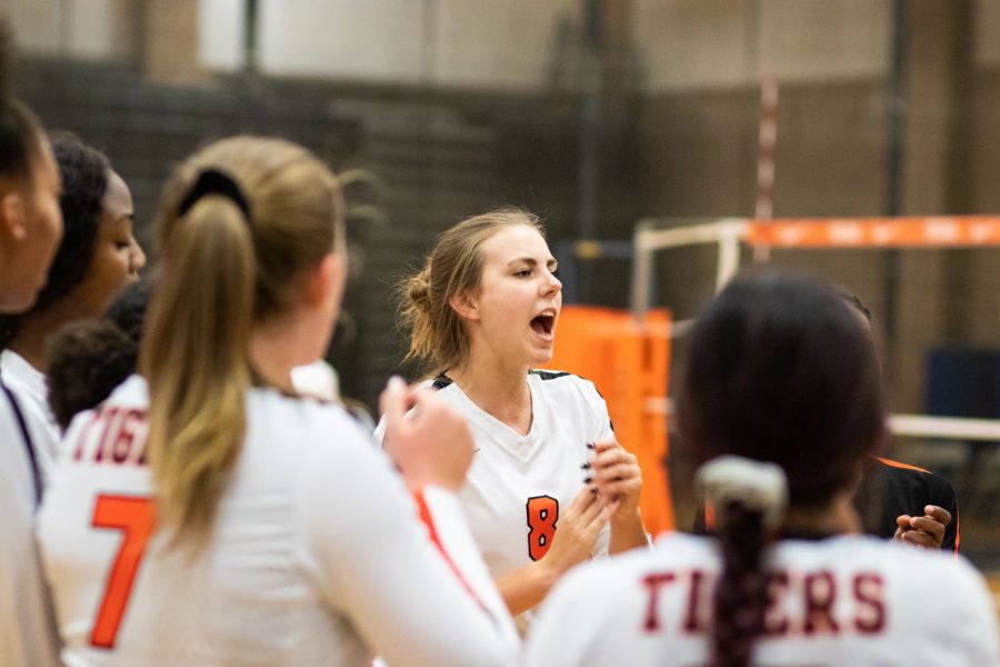 Senior Olivia Lower cheers on her team during a volleyball game. The varsity game against Pleasant Grove was held on Sept. 10, 2019.