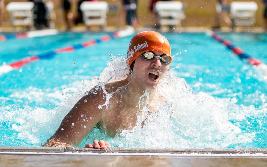 Senior+Joshua+Oldham+turns+during+his+200+IM+at+the+Tyler+Quad+Meet.+This+is+the+only+outdoor+meet+of+the+season%2C+and+give+swimmers+an+extra+time+to+qualify+for+Frisco+Tisca+times.