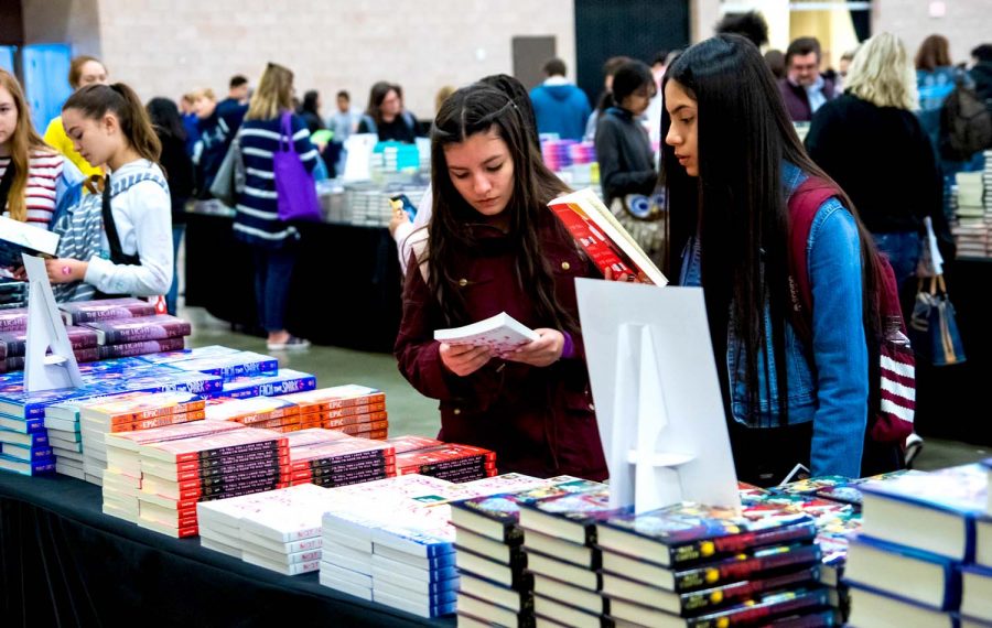 Teens browse through signed copies of books at  the North Texas Teen Book Festival in Irving, Texas. 