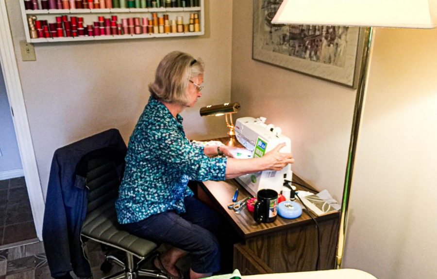 Submitted photo. Ellen Allard works on sewing masks and caps to donate to local hospitals and citizens. Many people had scraps of fabric around their house that they wanted to use effectively. 