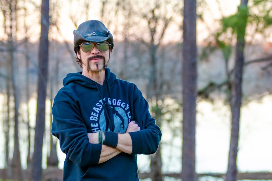 Lyle Blackburn poses in his Beast of Boggy Creek hoodie. Blackburn has written two books about the Fouke Monster as well as other legends across the country. 