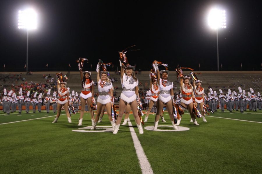 The Highsteppers pose prior to one of their performances at a football game earlier in the school year. Today, the Highsteppers put on a show in the PAC and performed their postponed Spring Show dance.