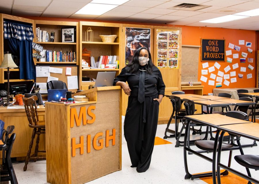 English teacher Jordan High poses in her new classroom. High began her teaching career this August alongside being a Radio DJ, dance teacher, an author and a mother.