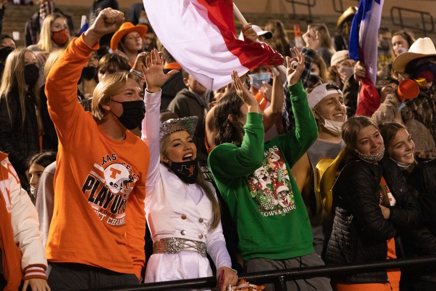 The student section at Grim Stadium celebrates in victory as the Texas Tigers win the game against the Lions.