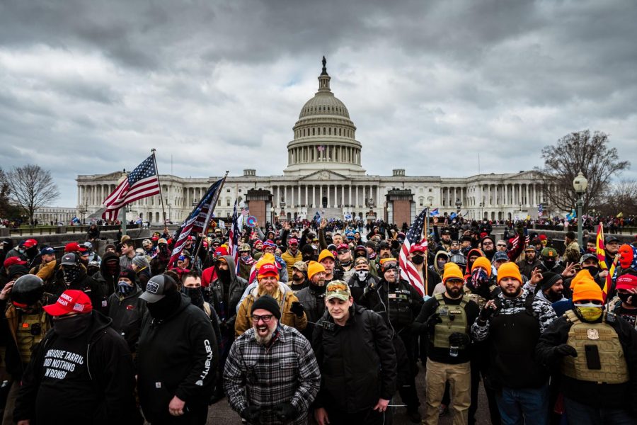 WASHINGTON, DC - JANUARY 06: Pro-Trump protesters gather in front of the U.S. Capitol Building on January 6, 2021 in Washington, DC. A pro-Trump mob stormed the Capitol, breaking windows and clashing with police officers. Trump supporters gathered in the nation's capital today to protest the ratification of President-elect Joe Biden's Electoral College victory over President Trump in the 2020 election. (Photo by Jon Cherry/Getty Images/TNS) 