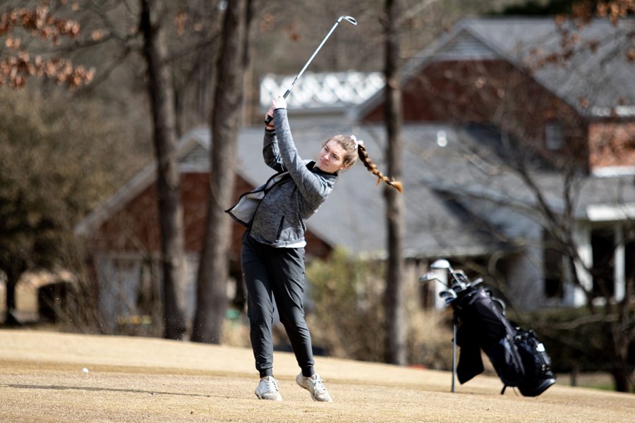 Junior Angie Parrott hits the ball during the Pleasant Grove Invitational at Northridge Country Club Feb. 25. Parrott shot a personal best of 87.