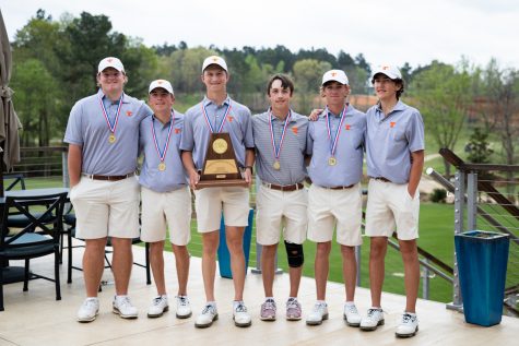The boys golf team stands together after placing second in Regionals. After they won, they are to compete in State in Austin on May 17-18. 