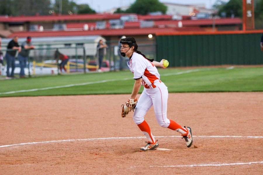 Pitcher Olivia Huckabee prepares to hurl a pitch in the Lady Tigers home game against the Marshall Mavericks. The Tigers won with a score of 6-4.