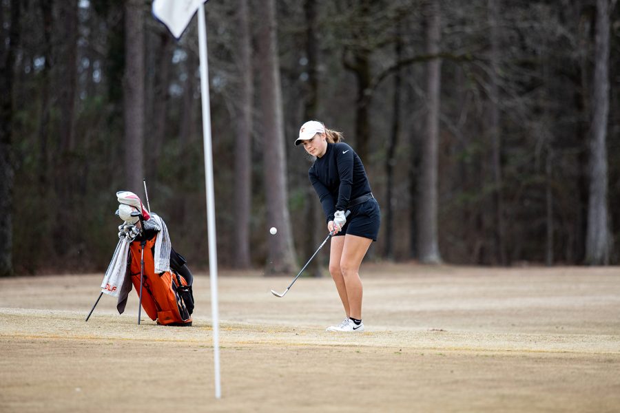 Senior Graci Henard takes a shot at Northridge Country Club. The team placed sixth at regionals on April 19-20.