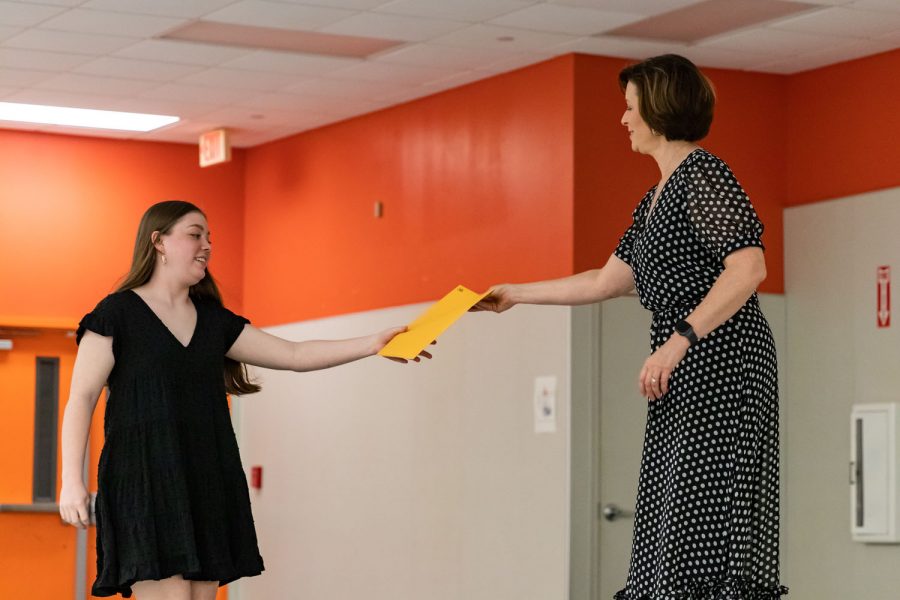 Senior Newspaper EIC Cate Rounds gleams with pride as she receives her award certificates for the 2020-2021 year. Members of Texas High Publications participated in their annual banquet May 18, 2021.