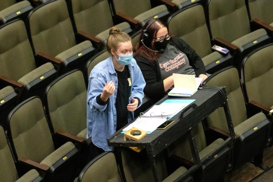 Almuni Salem Karr and Cate Rounds lead rehearsals for Puffs during the fall of their senior year. Karr was the head stage manager for this show.