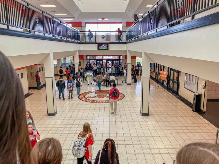 Administrators and school staff monitor students at the main entrance to the THS Math and Science building during lunches. Many parents withdrew their students from school today because of rumors of potential violence at Texas High School.