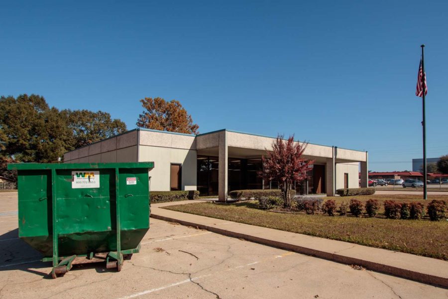 A demolition dumpster sits outside of the former Domino Federal Credit Union at 2208 Kennedy Lane which was purchased by Texarkana ISD last May. TISD Maintenance crews have started work on the remodeling of the building, but the plans for the future use of the building have not been made public by the school district.
