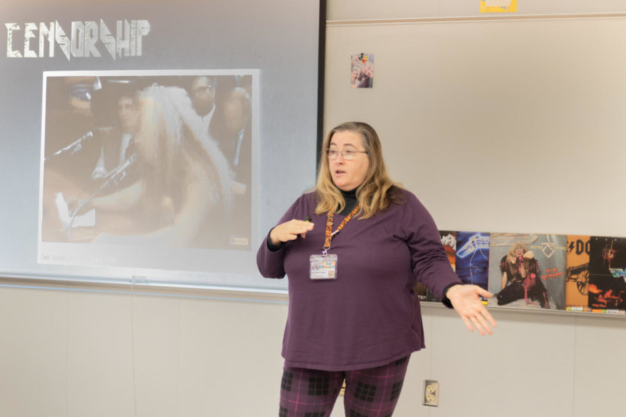 Social studies teacher Michelle Crane speaks in front of one of her classes. Many think teachers deserve a pay raise for their work in educating young minds.