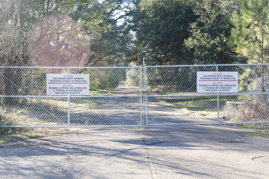 The gate to Carver Terrace stands as the barrier between the toxic, abandoned neighborhood and the rest of Texarkana.