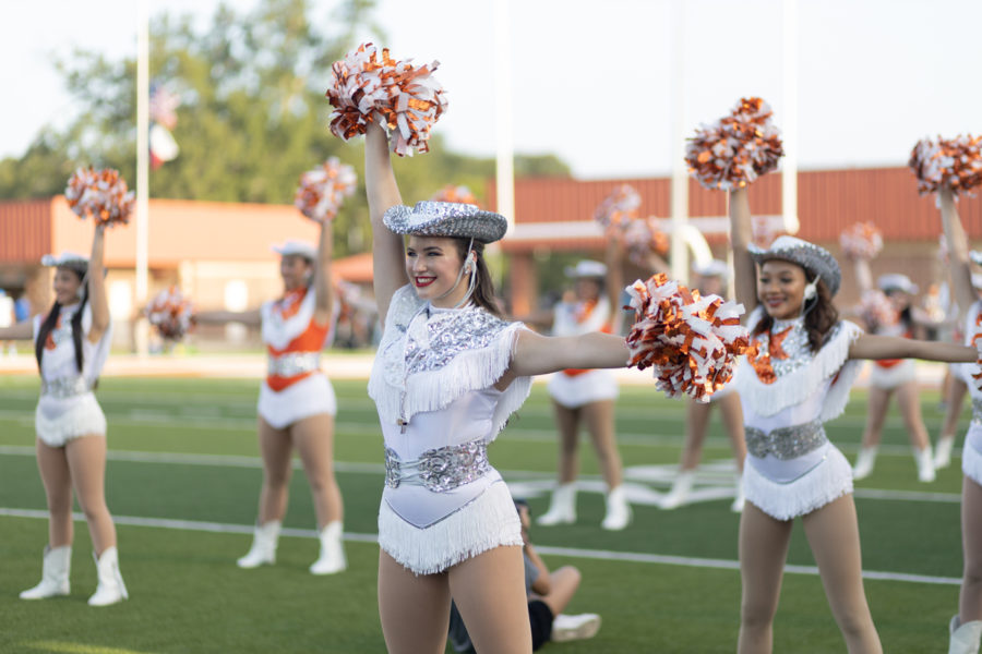 Senior Olivia George performs as the HighSteppers captain with the rest of her team. George plans on furthering her experience in dance, possibly pursuing a career as a Radio City Rockette.