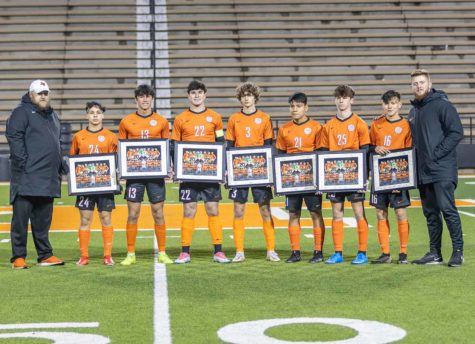 Seniors gather before the game to celebrate the hard work theyve put in for the program on the boys soccer senior night. The Tigers ended the season with a district record of one win and 10 losses.