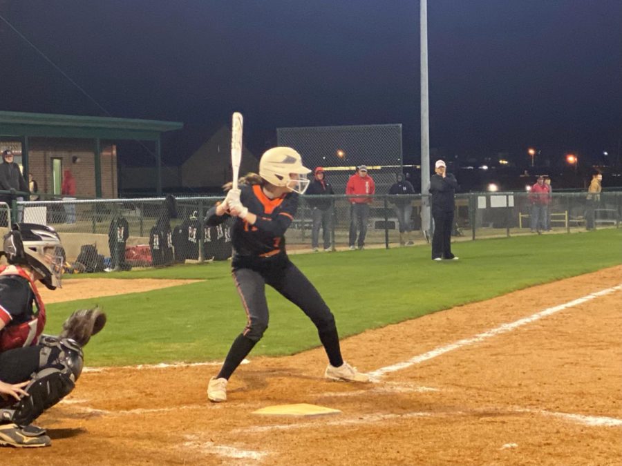 Sophomore Mally Lumpkins waits for the pitch in the game against the Marshall Mavericks. The Lady Tigers won 10-4 in the district opener.