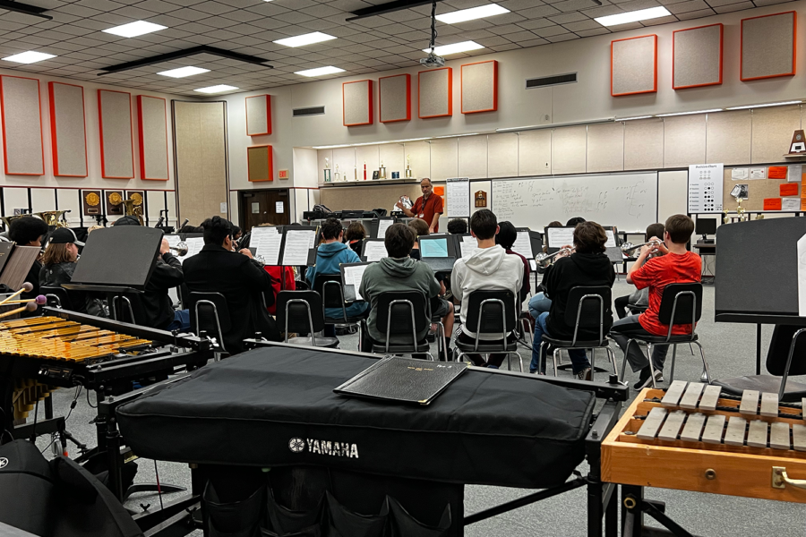 Assistant Band Director Steve Bennett leads the band in rehearsal. 