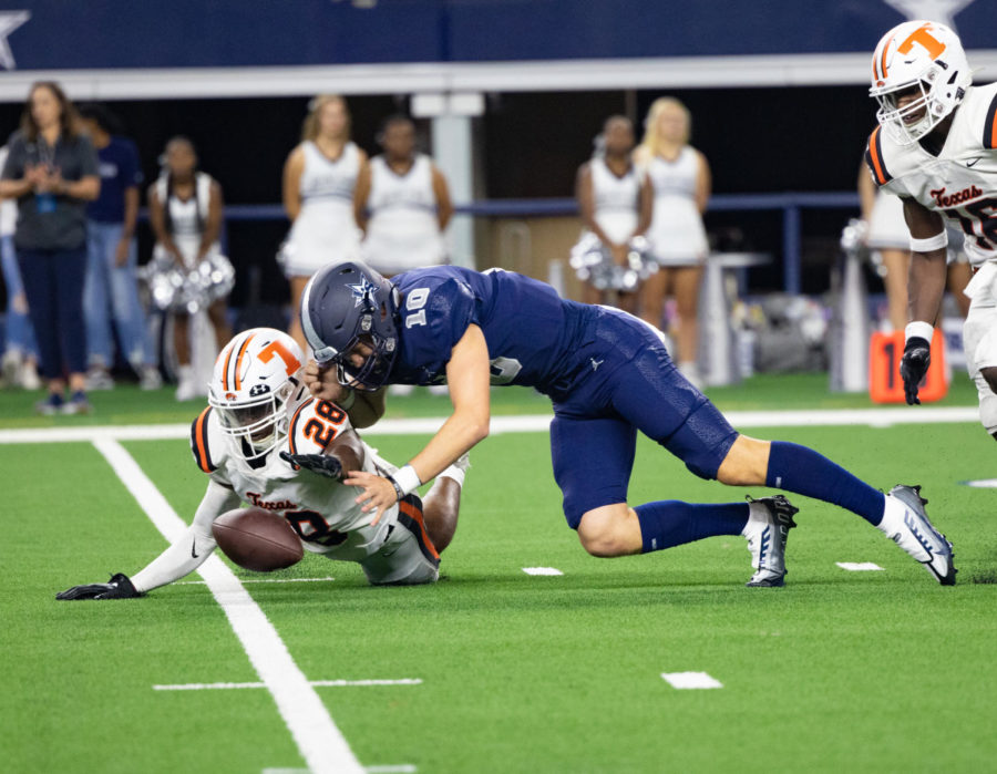 Linebacker Donnie Grissom fights for a fumble against Frisco Lone Star. The Lone Star Rangers took the game 38-33. 
