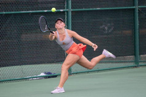 Junior Grace Wilson goes for a ball in match against the Longview Lobos. The Tigers lost to the Lobos 12-7 Aug 30, 2022.