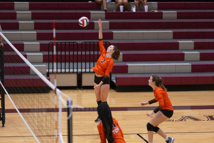 Junior CY Hopkins swings at ball against the Whitehouse Lady Wildcats in first district match. The Lady Tigers defeated Whitehouse 3-1 Sept 9, 2022.