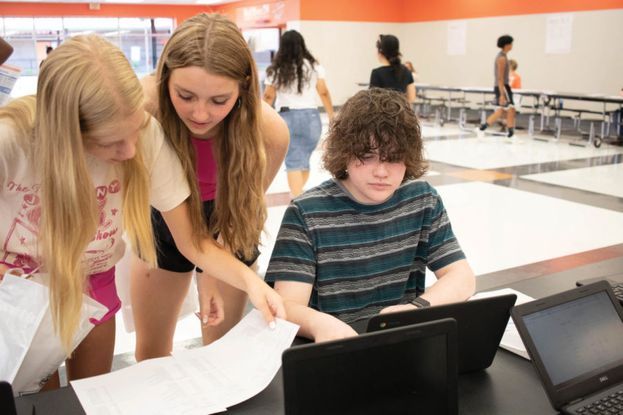 Sophmore Peyton Tullos types on the new student issued chromebooks on schedule pick-up day.